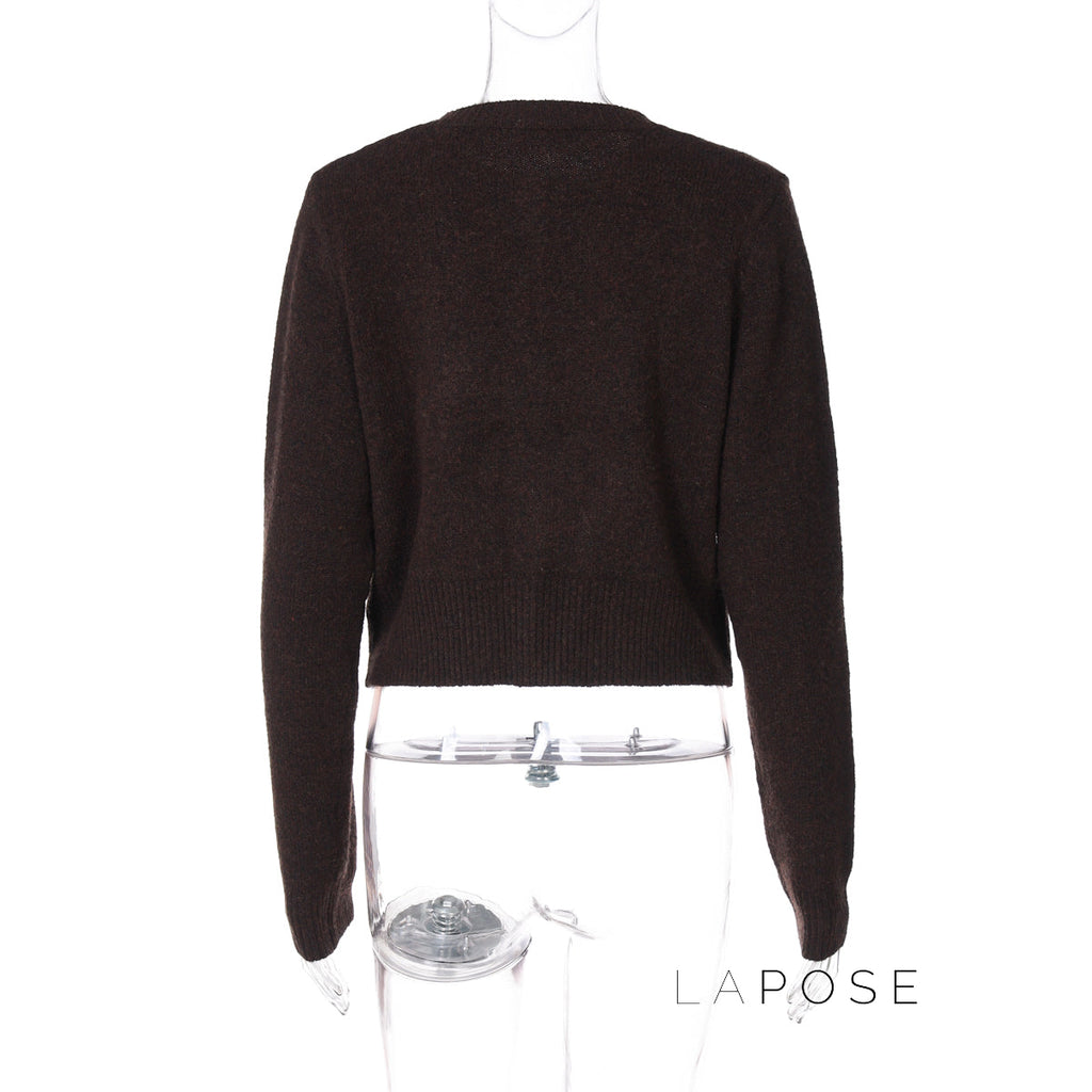 A Vintage Style Cardigan with Delicate Timeless Details