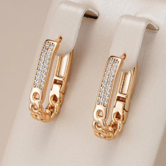 Aretes de Clip con Cadena Brillantes en Oro