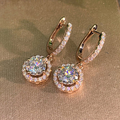 Aretes Redondos de CIrconitas en Oro