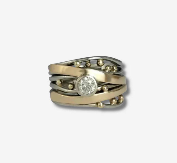 Gold Ring Encrusted With Zirconium