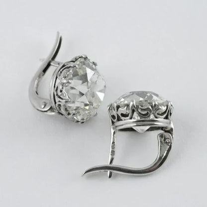 1+1 Offer: Layered Zirconia Ring + Zirconia Silver Earrings